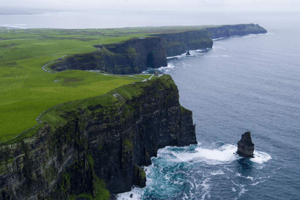 The Cliffs of Moher on Ireland’s west coast, soaring 700 feet above the Atlantic Ocean, offering breathtaking views and dramatic landscapes.